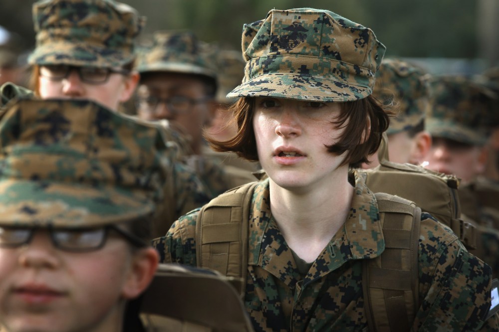 Marine Recruit Haley Evans from St Louis, Missouri stands in formation during boot camp February 27, 2013.