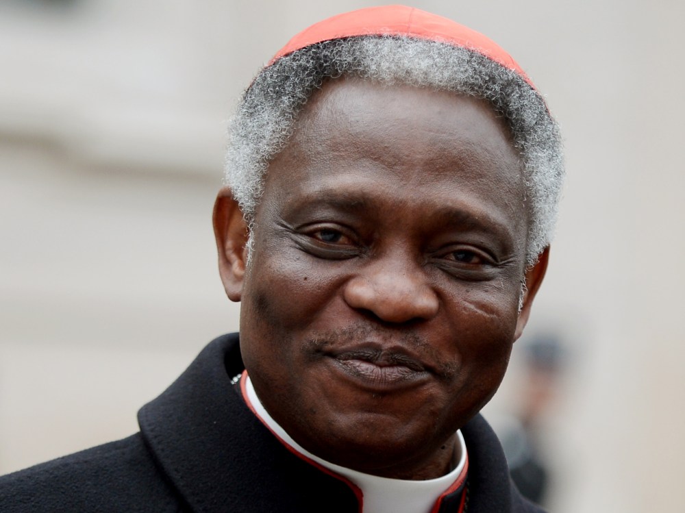 Ghanaian cardinal Peter Kodwo Appiah Turkson arrives to take part in an afternoon meeting of pre-conclave on March 8, 2013 at the Vatican. The day before, the next pope's ideal profile began to take shape as cardinals held a second day of pre-conclave...