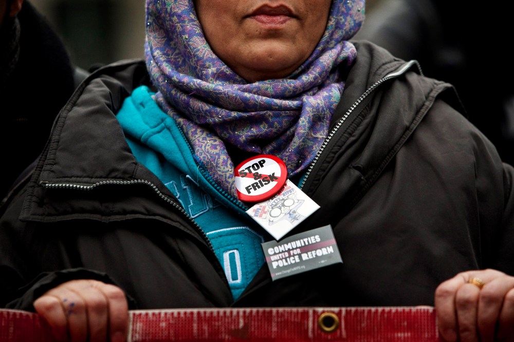 A woman participates in a demonstration against the city's "stop and frisk" searches in lower Manhattan near Federal Court March 18, 2013 in New York City.