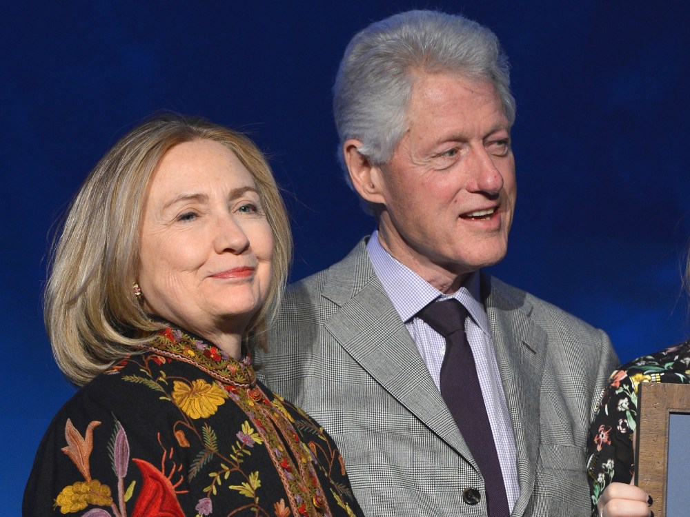 Former president Bill Clinton and former Secretary of State Hillary Clinton attend SeriousFun Children's Network event honoring Liz Robbins with celebrity guests at Pier Sixty at Chelsea Piers on April 4, 2013 in New York City. (Photo by Larry Busacca...