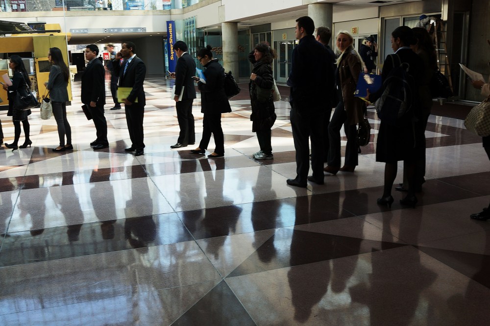Job seekers wait in line to meet with employers at the 25th Annual CUNY big Apple Job and Internship Fair at the Jacob Javits Convention Center on April 26, 2013 in New York, NY.
