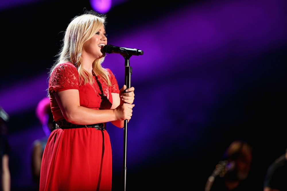 Singer Kelly Clarkson performs during the 2013 CMA Music Festival on June 8, 2013 at LP Field in Nashville, Tenn. (Photo by Christopher Polk/Getty)