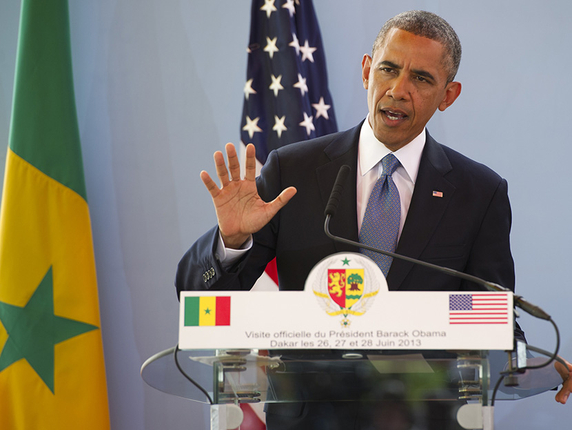 US President Barack Obama speaks during a press conference with Senegal's President following meetings at the Presidential Palace in Dakar, June 27, 2013. (Photo by Saul Loeb/AFP/Getty Images)