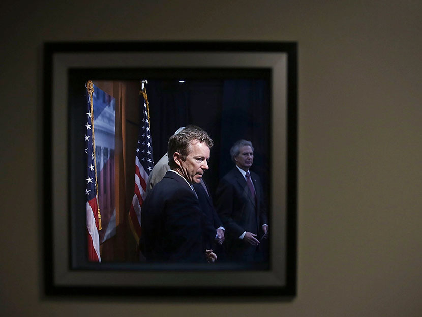 U.S. Sen. Rand Paul listens during a news conference on Syria June 27, 2013 on Capitol Hill in Washington, DC. (Photo by Alex Wong/Getty)
