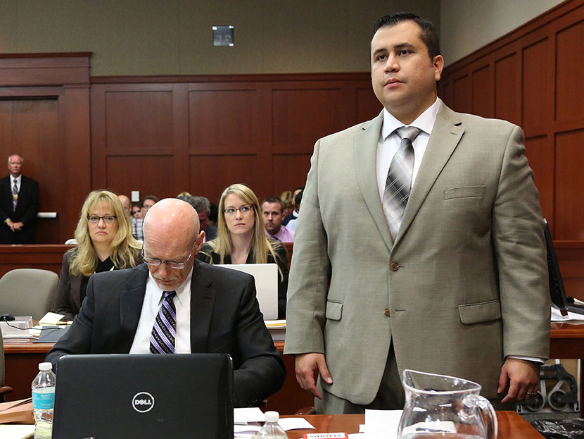 George Zimmerman with defense counsel Don West, listens to judge Debra Nelson as she questions him on his understanding of the proceedings, in Seminole circuit court, July 9, 2013 in Sanford, Florida. (Photo by Joe Burbank/Pool/Getty Images)