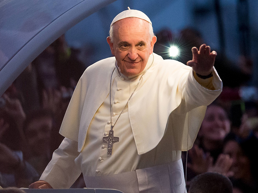 Pope Francis waves from the Popemobile on his way to attend the Via Crucis on Copacabana Beach during World Youth Day celebrations on July 26, 2013 in Rio de Janeiro, Brazil. (Photo by Buda Mendes/Getty Images)