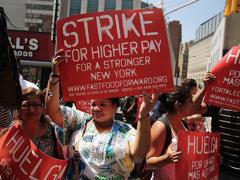 Employees and supporters demonstrate outside of a Wendy's fast-food restaurant to demand higher pay and the right to form a union on July 29, 2013 in New York City. (Photo by Spencer Platt/Getty Images)