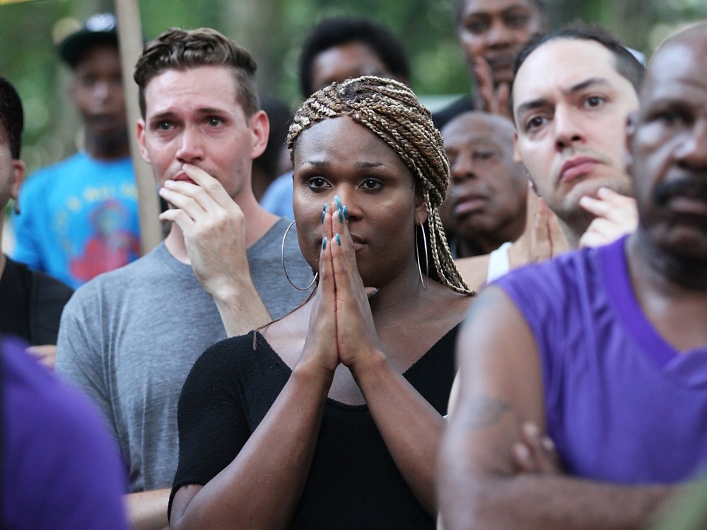 People gather at a vigil for transgender woman Islan Nettles at Jackie Robinson Park in Harlem on August 27, 2013 in New York City.