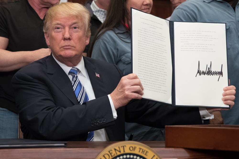 Image: US President Donald J. Trump signs a presidential proclamation on tariffs