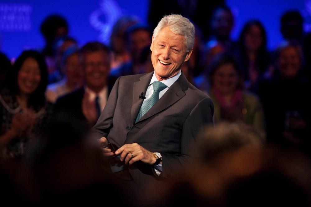 Former U.S. President Bill Clinton smiles during a taping of CNN's Piers Morgan Tonight at the annual Clinton Global Initiative (CGI) meeting on Sept. 25, 2013 in New York City. (Photo by Ramin Talaie/Getty Images)