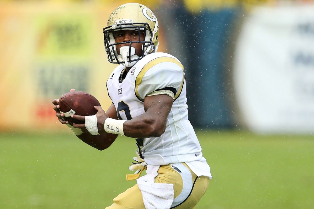 Running back Tony Zenon #9 of the Georgia Tech Yellow Jackets runs with the ball during the game against the North Carolina Tar Heels, Sept. 21, 2013.