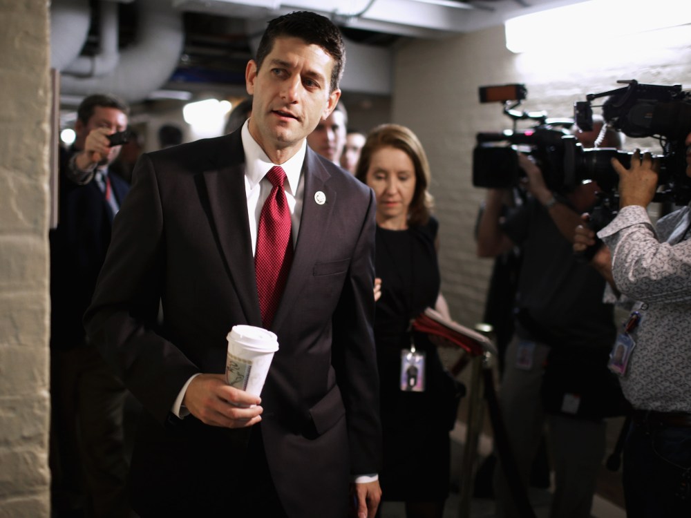 House Budget Committee Chairman Paul Ryan (R-WI) heads for a House Republican caucus meeting at the U.S. Capitol October 4, 2013 in Washington, DC.