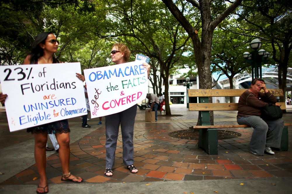 Supporters of the Affordable Care Act rally in Miami on October 10, 2013.
