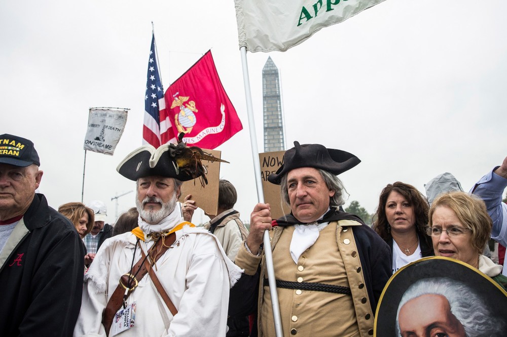 Tea Party activists and Republicans gather at at the World War Two Memorial, on October 13, 2013.