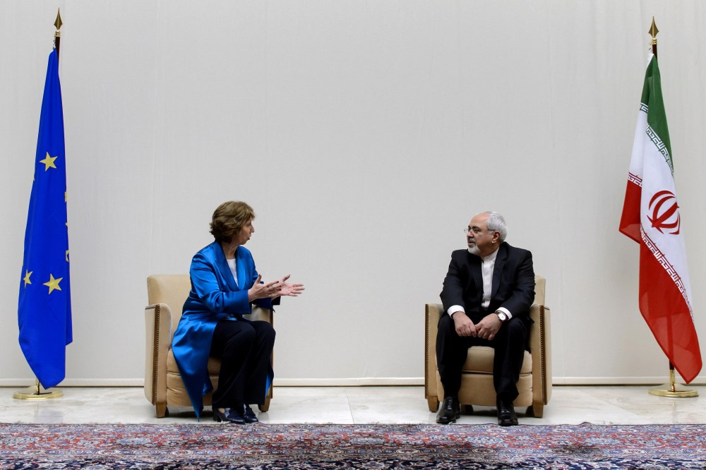 EU High Representative for Foreign Affairs Catherine Ashton (L) speaks with Iranian Foreign Minister Mohammad Javad Zarif during a photo-op prior the start of two days of closed-door nuclear talks