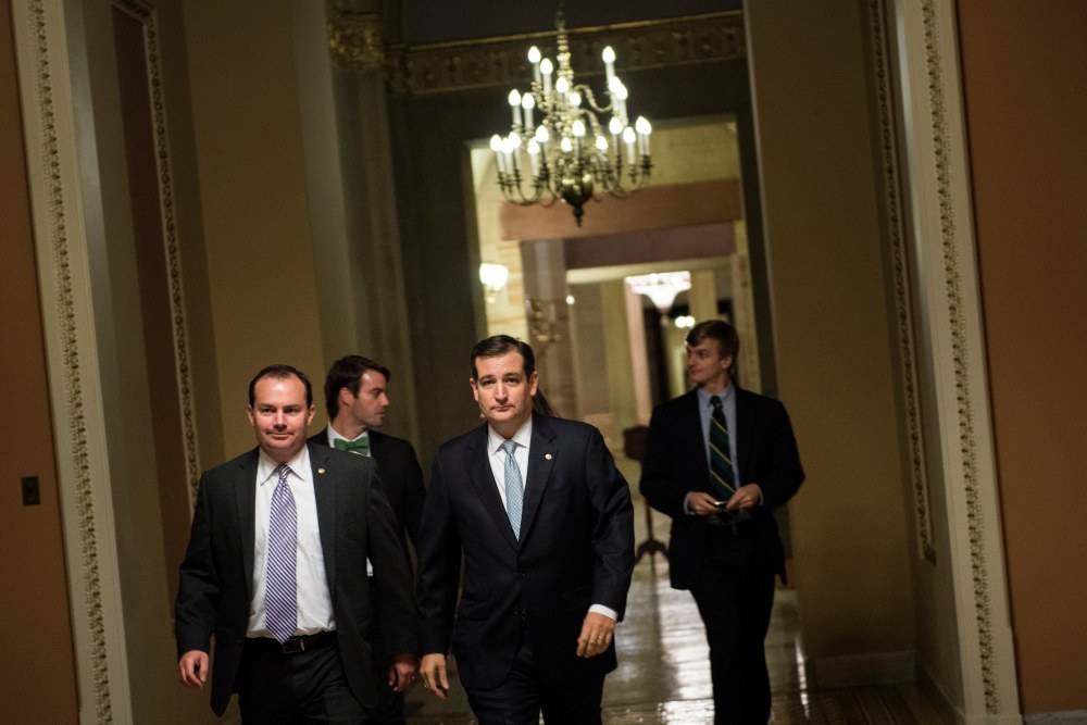 Senator Ted Cruz walks to a vote on Capitol Hill October 16, 2013 in Washington, DC.