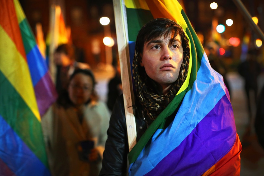 Bryan White joins other supporters of same-sex marriage at a rally to celebrate Illinois General Assembly's passing of a gay marriage bill on November 7, 2013.
