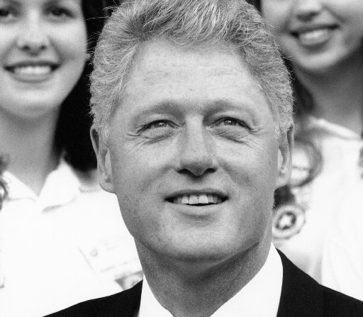 In this file photo,  President Bill Clinton stands outside the North Portico of the White House with the Girls Nation group in 1996 in Washington, D.C. (Photo by David Hume Kennerly/Getty Images)