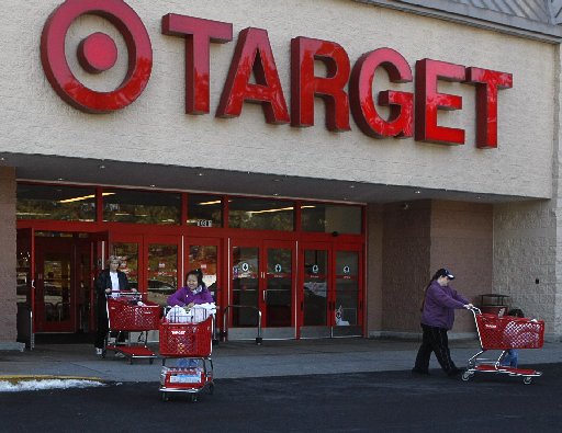 Shoppers exit a Target store with their purchases in Fairfax, Virginia, February 4, 2010. (REUTERS/Stelios Varias)