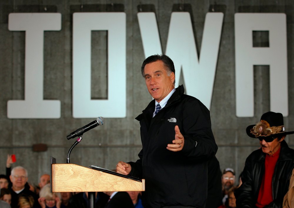 Image: Republican presidential nominee Mitt Romney speaks at a campaign rally in Dubuque
