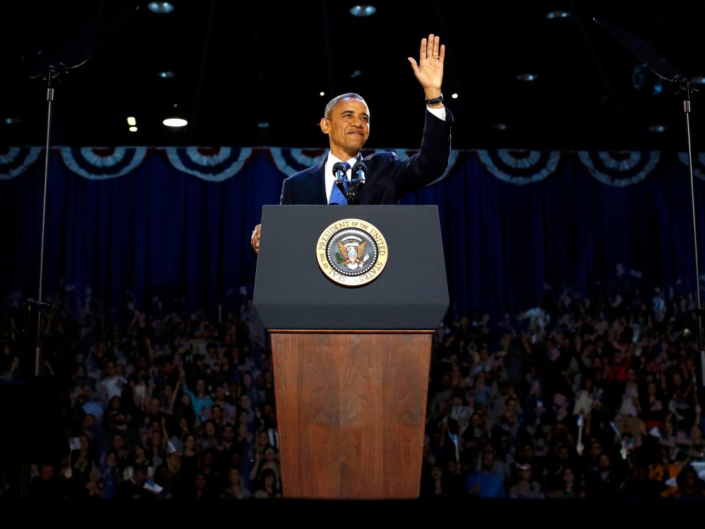 U.S. President Barack Obama acknowledges supporters while addressing his election night victory rally in Chicago, November 6, 2012.  (Photo by REUTERS/Jason Reed)