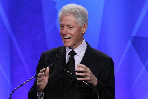 Former U.S. President Bill Clinton speaks on stage after he received the Advocate for Change Award during the 24th Annual GLAAD Media Awards at JW Marriott Los Angeles at L.A. LIVE in Los Angeles, California, April 20, 2013. REUTERS/Jonathan Alcorn ...