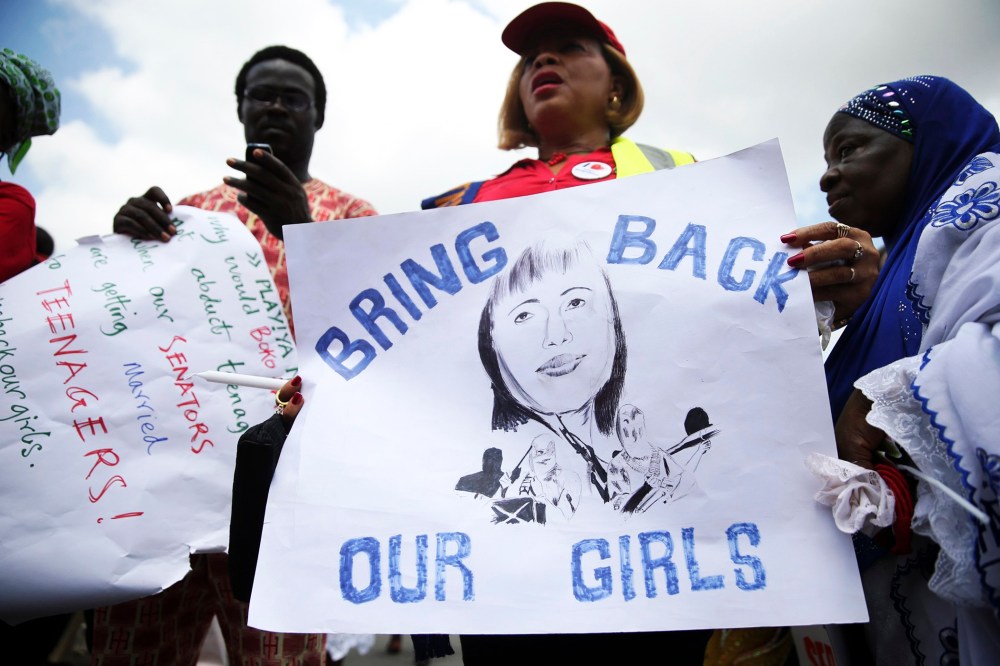 People take part in a protest demanding the release of abducted secondary schoolgirls from the remote village of Chibok, in Lagos May 5, 2014.