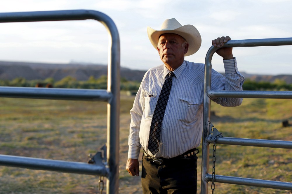 Rancher Cliven Bundy stands near a metal gate on his 160 acre ranch in Bunkerville, Nevada, in this May 3, 2014, file photo. (Photo by Mike Blake/Reuters)