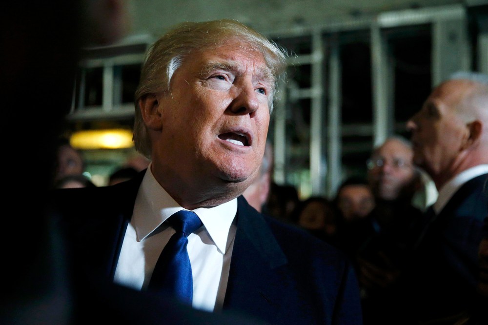 Republican U.S. presidential candidate Donald Trump speaks to reporters  in Washington, D.C., March 21, 2016. (Photo by Jim Bourg/Reuters)