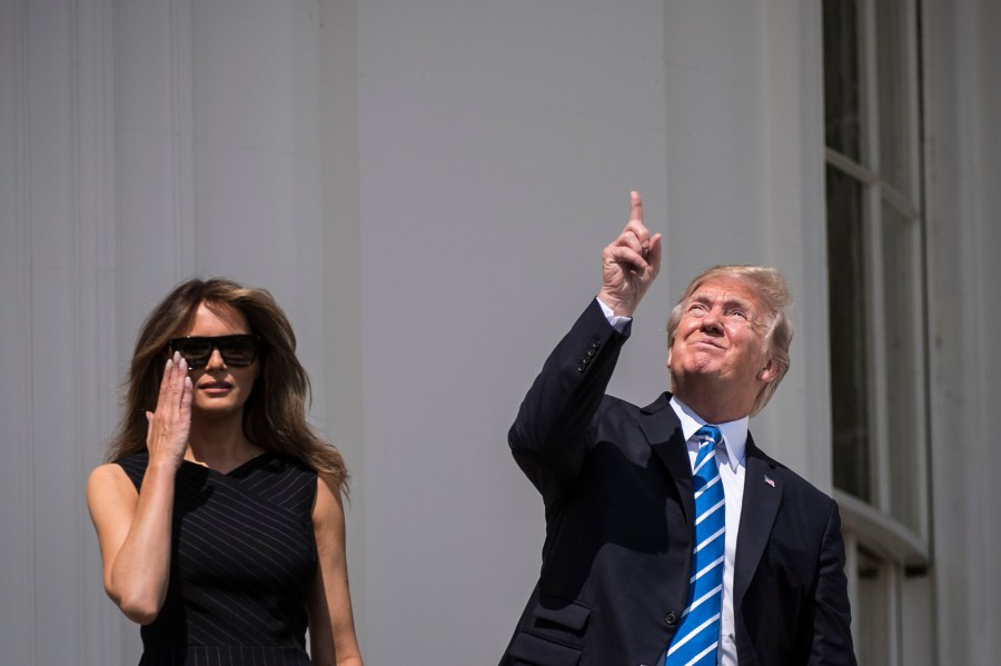 Then-President Donald Trump looks up toward the Solar Eclipse