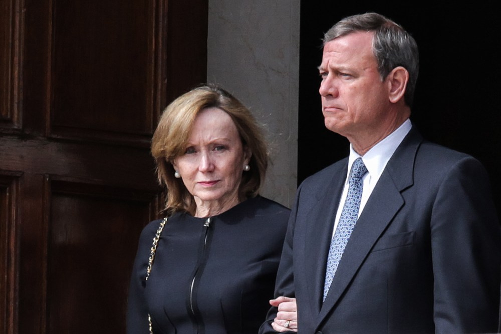 Supreme Court Chief Justice John Roberts and his wife Jane Roberts leave the Basilica of the National Shrine of the Immaculate Conception following the funeral of Associate Justice Antonin Scalia Feb. 20, 2016 in Washington, DC.