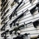 A selection of AR-15-style rifles hangs on a wall at R-Guns store on Jan. 11, 2023, in Carpentersville, Ill.