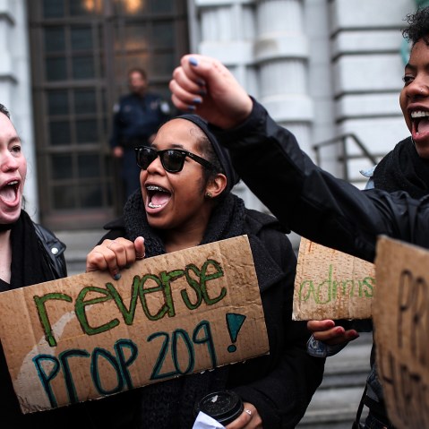 Students hoping for a repeal of California's Proposition 209 hold signs as they protest outside of the Ninth U.S. Circuit Court of Appeals on Feb. 13, 2012 in San Francisco.