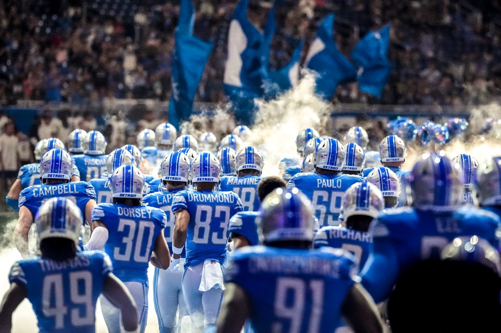 The Detroit Lions take the field against the Jacksonville Jaguars before the preseason game at Ford Field on Aug. 19, 2023 in Detroit.