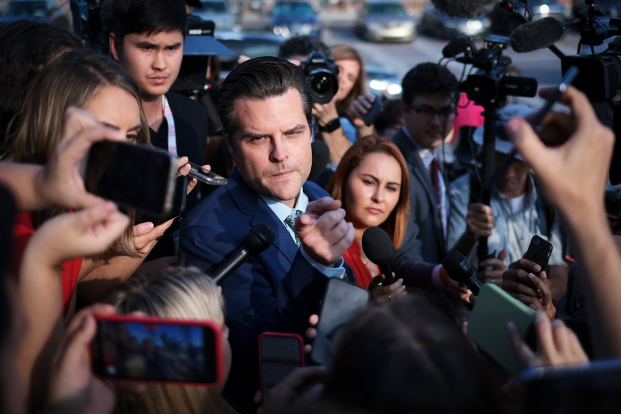 Rep. Matt Gaetz, R-Fla., answers questions from members of the media outside the Capitol.