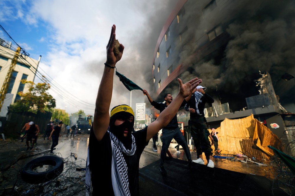 Protesters chant slogans during a demonstration in solidarity with Palestinians in Gaza, near the U.S. embassy in Beirut.
