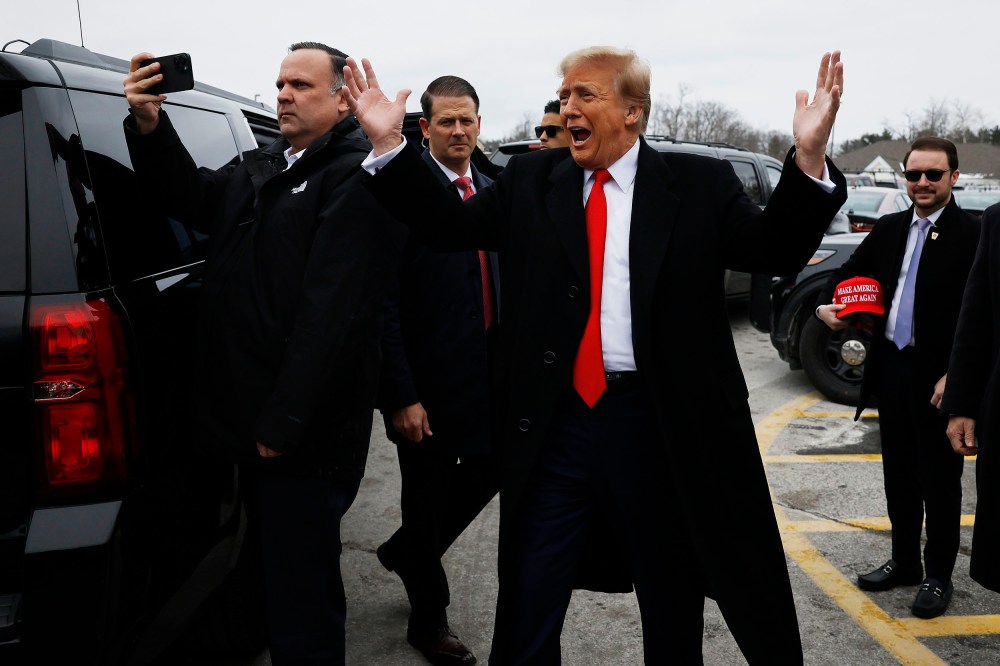 Republican presidential candidate, former President Donald Trump visits a polling site at Londonderry High School on primary day in New Hampshire.