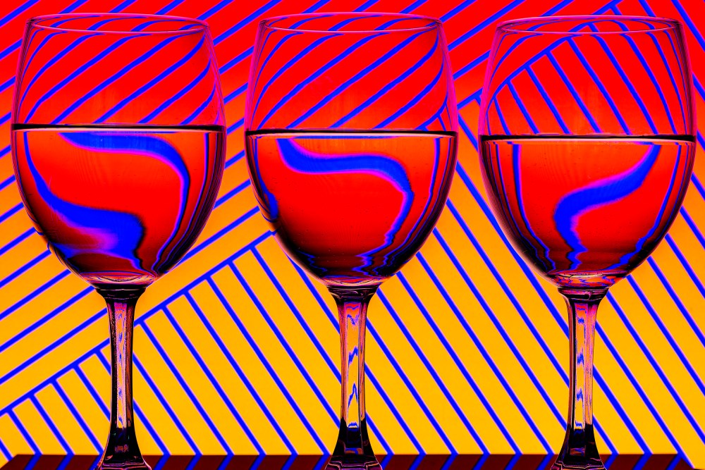 Close-up of wineglasses on table