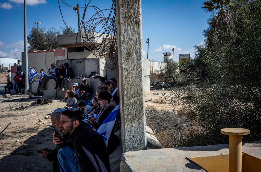 Israeli right-wing activists block the Nitzana Border Crossing between Israel and Egypt to prevent trucks with aid from entering the Gaza Strip on Feb. 14, 2024. 