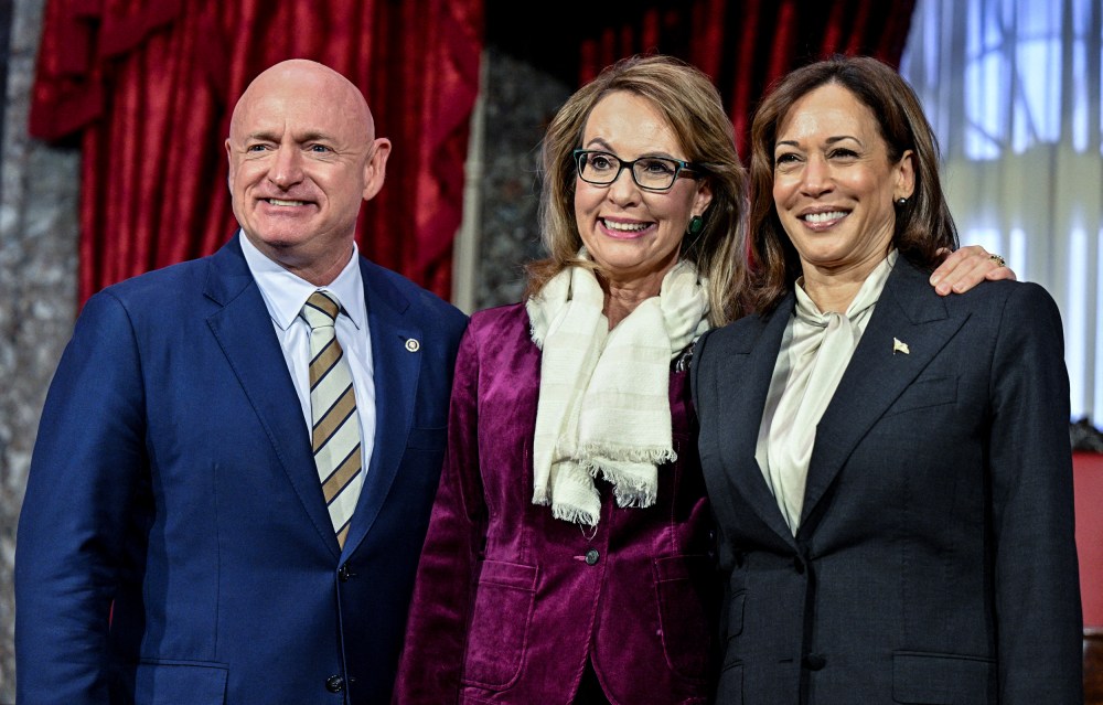 Sen. Mark Kelly, D-Ariz., poses with his wife and former U.S. Rep. Gabby Giffords and Vice President Kamala Harris