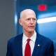 Sen. Rick Scott arrives for a vote at the Capitol.