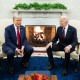 Joe Biden and Donald Trump sit in the White House