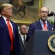 President Donald Trump listens as acting director of the Office of Management and Budget Russ Vought speaks at the White House in 2019.