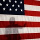 Shadow of a political candidate on a flag