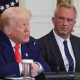 Health and Human Services Secretary Robert F. Kennedy Jr. listens as President Donald Trump speaks