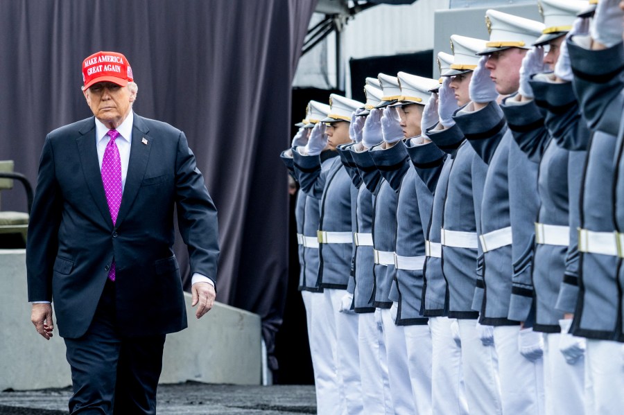 Image: President Donald Trump arrives to deliver the commencement address 