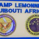 Two seals representing Camp Lemmonier, Djibouti Africa are seen on a wall