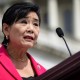 Judy Chu speaks outside at a podium