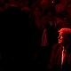 Donald Trump in red lighting.