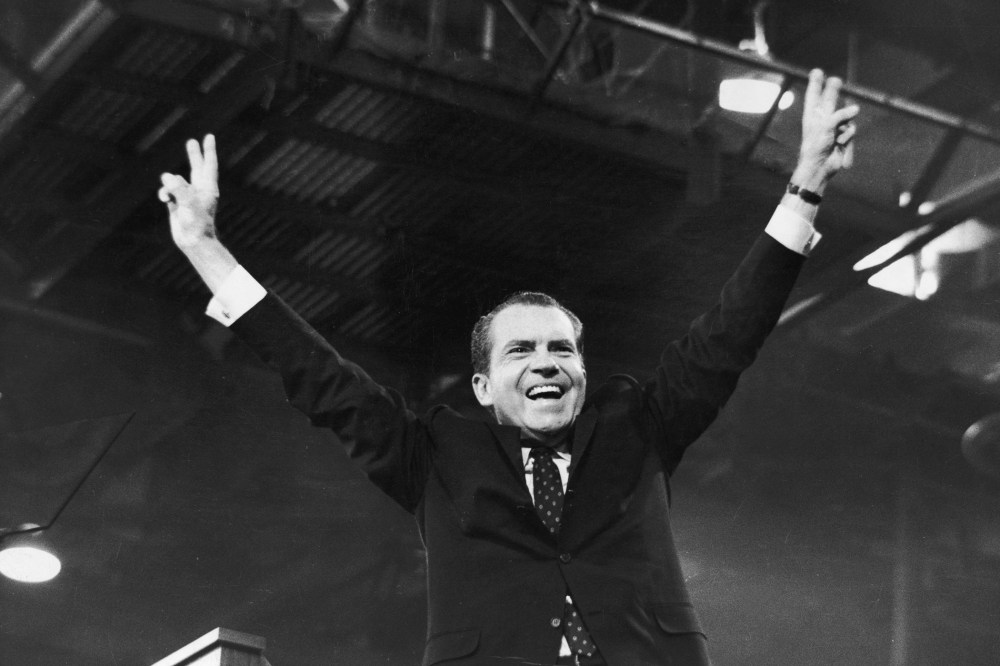Richard Nixon gives the 'V' for victory sign after receiving the presidential nomination at the Republican National Convention, August 1968, in Miami, Fla.